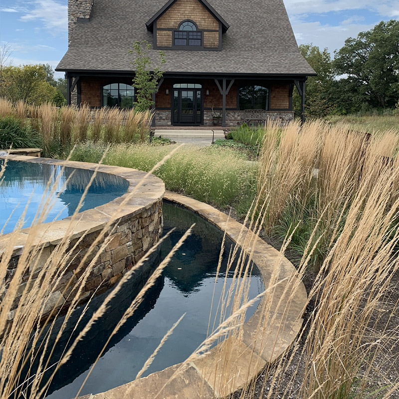 Swimming pool, retaining wall with landscape architecture